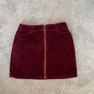 Maroon front zip mini skirt
